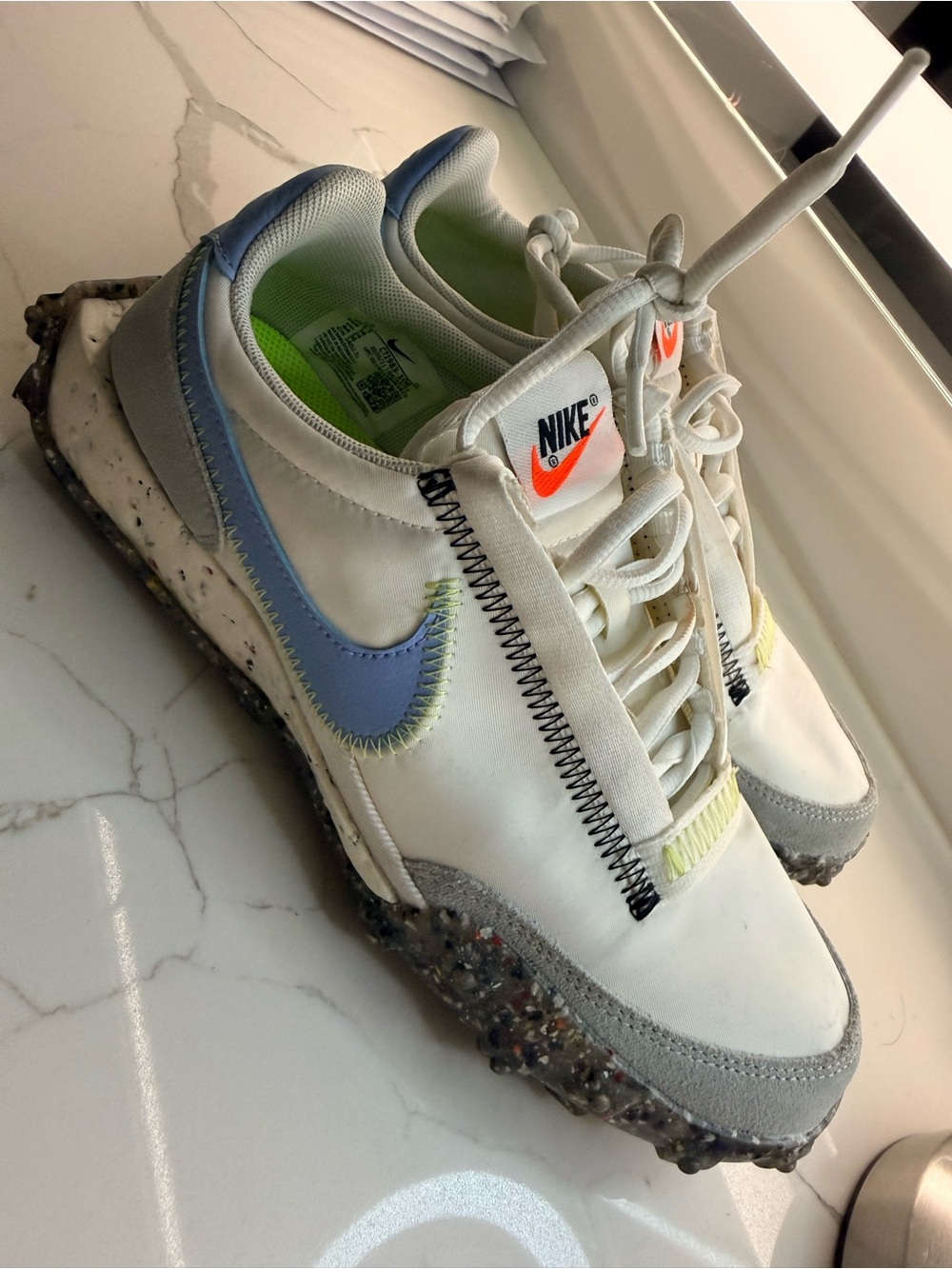 Nike Kids White Sneakers with Light Blue Swoosh